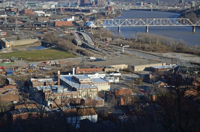 Oyler School sits near the Ohio River, just a few miles—but a world away—from downtown Cincinnati. Once home to many factories and retail businesses, the neighborhood became an “economic desert,” says Hockenberry, plagued by industrial pollution. Recent efforts to improve riverfront access and replace a noisy viaduct that bordered the neighborhood are expected to improve the quality of life. Photo by Amy Scott. © 2013, Amy Scott.