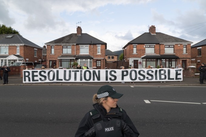 Residents protest a parade route that skirts a Catholic neighborhood.