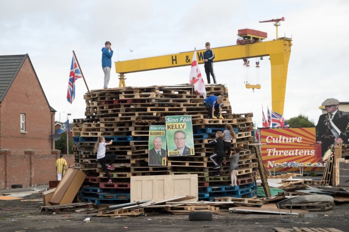 While the Union Jack and Ulster Banner will be removed before the bonfire is lit, the Sinn Féin election posters will not.