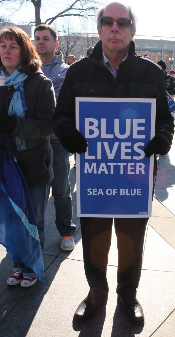 An attendee at a January 2015 End the Madness/Sea of Blue march in Washington, D.C. Photo by Elvert Xavier Barnes, elvertbarnes.com.