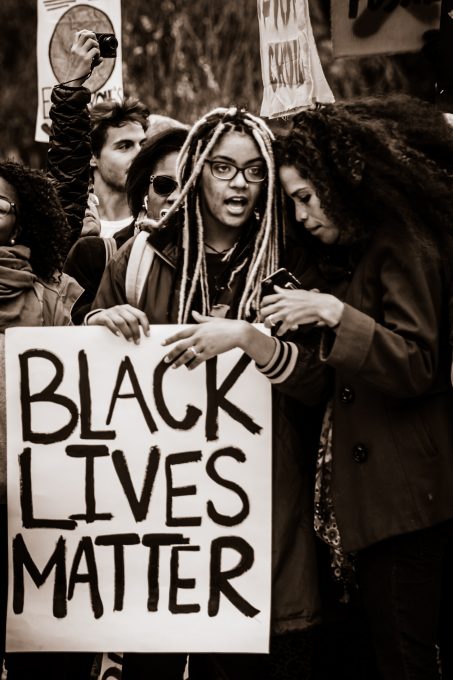 An attendee at a November 2015 rally. Johnny Silvercloud, Flickr CC